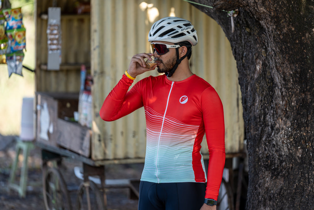 Man drinking tea wearing Jorhat Snug-fit Cycling Jersey